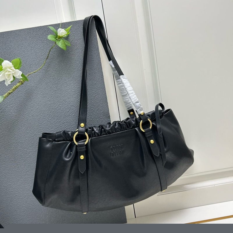 Pra*a top handle bags